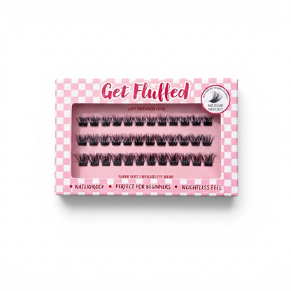 Box of cluster press on eyelashes with 'Get Fluffed' branding on a white background