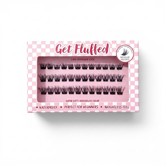 Box of cluster press on eyelashes with 'Get Fluffed' branding on a white background