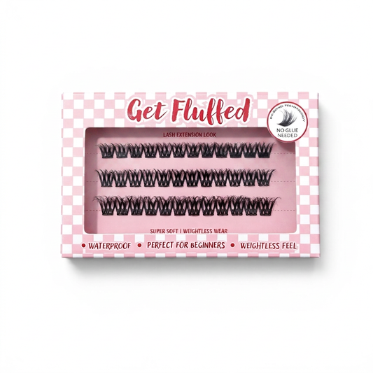 Box of cluster press on eyelashes with 'Get Fluffed' branding on a white background